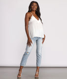 With fun and flirty details, Sleeveless Spaghetti Strap Cami Top shows off your unique style for a trendy outfit for the summer season!