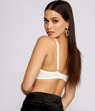 With fun and flirty details, Beaded Pearl and Rhinestone Bra shows off your unique style for a trendy outfit for the summer season!
