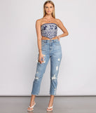 With fun and flirty details, Smocked Floral Fusion Tube Scarf Top shows off your unique style for a trendy outfit for the summer season!