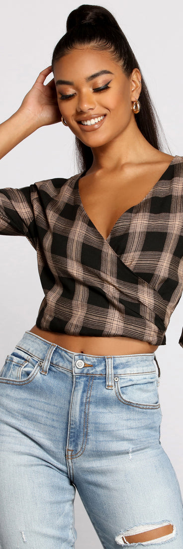 With fun and flirty details, Pretty In Plaid Crop Top shows off your unique style for a trendy outfit for the summer season!