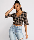 With fun and flirty details, Pretty In Plaid Crop Top shows off your unique style for a trendy outfit for the summer season!