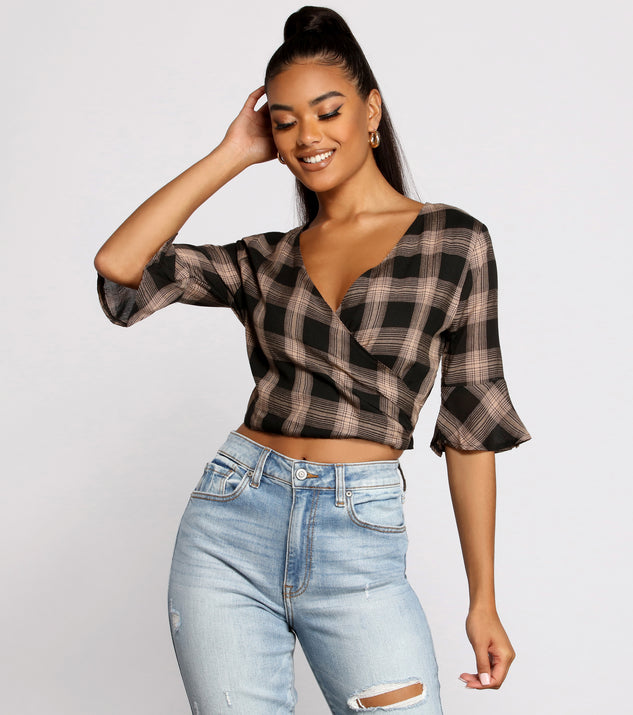 With fun and flirty details, Pretty In Plaid Crop Top shows off your unique style for a trendy outfit for the summer season!