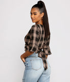 With fun and flirty details, Pretty In Plaid Crop Top shows off your unique style for a trendy outfit for the summer season!