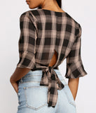 With fun and flirty details, Pretty In Plaid Crop Top shows off your unique style for a trendy outfit for the summer season!