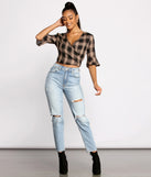 With fun and flirty details, Pretty In Plaid Crop Top shows off your unique style for a trendy outfit for the summer season!