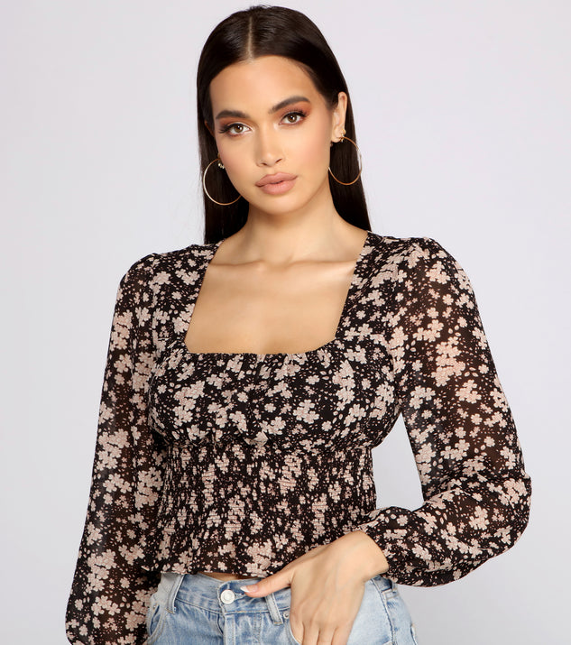 With fun and flirty details, Floral Charm Smocked Long Sleeve Top shows off your unique style for a trendy outfit for the summer season!
