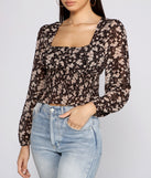With fun and flirty details, Floral Charm Smocked Long Sleeve Top shows off your unique style for a trendy outfit for the summer season!