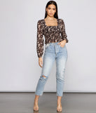 With fun and flirty details, Floral Charm Smocked Long Sleeve Top shows off your unique style for a trendy outfit for the summer season!