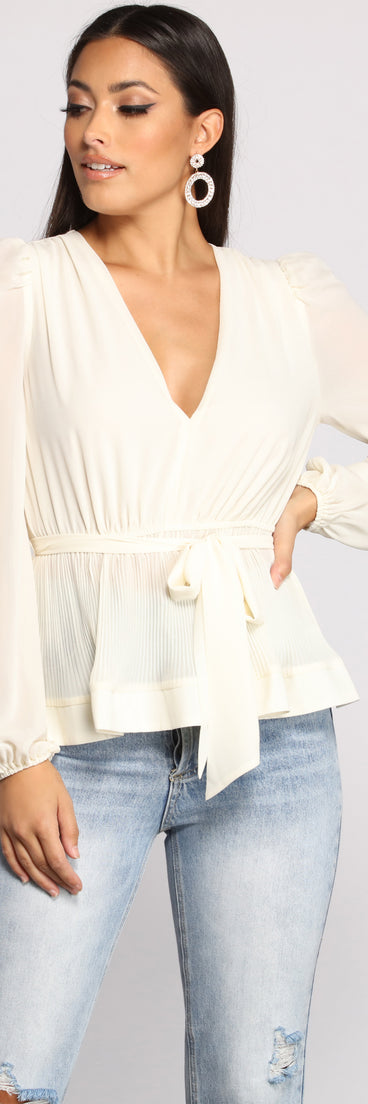 With fun and flirty details, Tie Front Chiffon Peplum Top shows off your unique style for a trendy outfit for the summer season!
