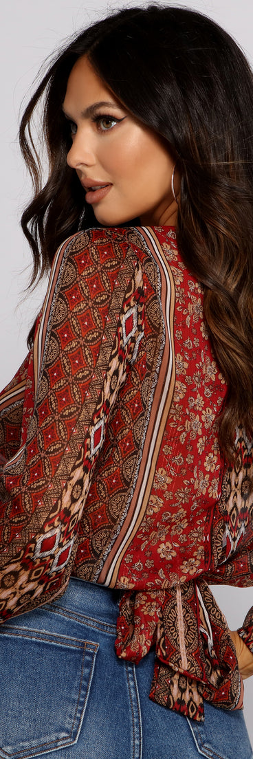 The trendy Bohemian Beauty Surplice Tie Back Top is the perfect pick to create a holiday outfit, new years attire, cocktail outfit, or party look for any seasonal event!