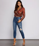 With fun and flirty details, Bohemian Beauty Surplice Tie Back Top shows off your unique style for a trendy outfit for the summer season!