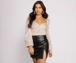 All that Glow Puff Sleeve Sequin Bodysuit creates the perfect New Year’s Eve Outfit or new years dress with stylish details in the latest trends to ring in 2023!
