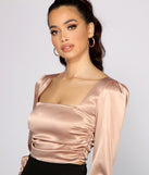 With fun and flirty details, Sleek Satin Puff Sleeve Crop Top shows off your unique style for a trendy outfit for the summer season!