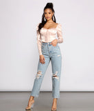 With fun and flirty details, Sassy Satin Cropped Corset Top shows off your unique style for a trendy outfit for the summer season!