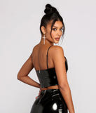 With fun and flirty details, Dangerous Woman Faux Patent Leather Crop Top shows off your unique style for a trendy outfit for the summer season!