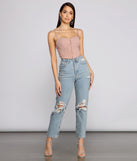 With fun and flirty details, So Glam Swiss Dot Corset Crop Top shows off your unique style for a trendy outfit for the summer season!