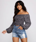 With fun and flirty details, Feelin' Flirty Ditsy Floral Crop Top shows off your unique style for a trendy outfit for the summer season!