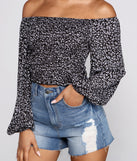 With fun and flirty details, Feelin' Flirty Ditsy Floral Crop Top shows off your unique style for a trendy outfit for the summer season!