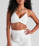 With fun and flirty details, Whisked Away Halter Crop Top shows off your unique style for a trendy outfit for the summer season!