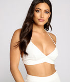 With fun and flirty details, Whisked Away Halter Crop Top shows off your unique style for a trendy outfit for the summer season!