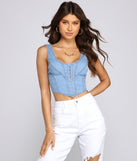 With fun and flirty details, Girl Next Door Denim Corset Top shows off your unique style for a trendy outfit for the summer season!