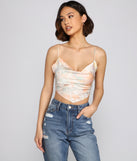 With fun and flirty details, Tie Dye Satin Scarf Top shows off your unique style for a trendy outfit for the summer season!