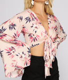 With fun and flirty details, Pretty In Paradise Crop Top shows off your unique style for a trendy outfit for the summer season!
