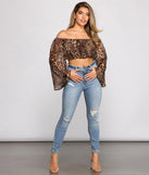 With fun and flirty details, Purrfect Style Chiffon Crop Top shows off your unique style for a trendy outfit for the summer season!