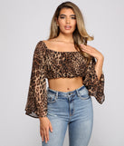 With fun and flirty details, Purrfect Style Chiffon Crop Top shows off your unique style for a trendy outfit for the summer season!
