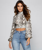 With fun and flirty details, Second Look Open Back Snake Top shows off your unique style for a trendy outfit for the summer season!