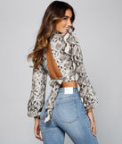With fun and flirty details, Second Look Open Back Snake Top shows off your unique style for a trendy outfit for the summer season!