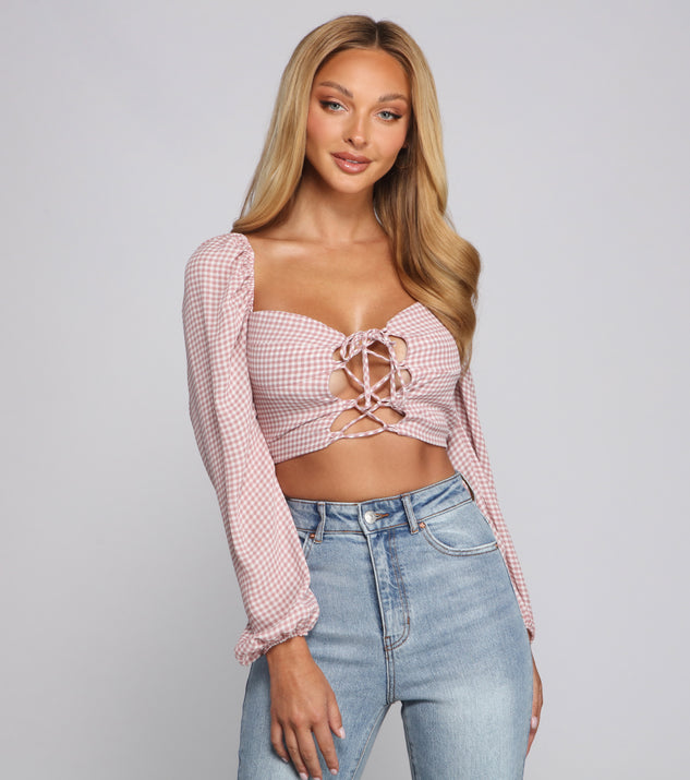 With fun and flirty details, Lace-Up Gingham Crop Top shows off your unique style for a trendy outfit for the summer season!