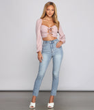 With fun and flirty details, Lace-Up Gingham Crop Top shows off your unique style for a trendy outfit for the summer season!