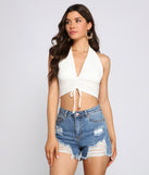 With fun and flirty details, Cinched And Chic Cropped Halter Top shows off your unique style for a trendy outfit for the summer season!