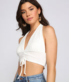 With fun and flirty details, Cinched And Chic Cropped Halter Top shows off your unique style for a trendy outfit for the summer season!