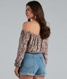 With fun and flirty details, Effortless Beauty Boho Cropped Blouse shows off your unique style for a trendy outfit for the summer season!