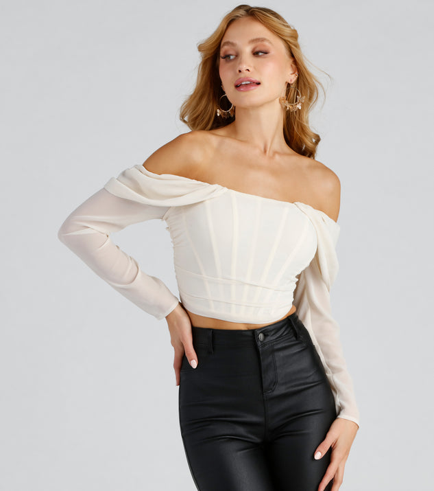 Effortless And Chic Cropped Corset Top creates the perfect New Year’s Eve Outfit or new years dress with stylish details in the latest trends to ring in 2023!