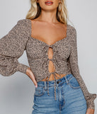 With fun and flirty details, Queen Of The Jungle Tie Front Top shows off your unique style for a trendy outfit for the summer season!