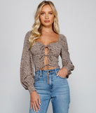 With fun and flirty details, Queen Of The Jungle Tie Front Top shows off your unique style for a trendy outfit for the summer season!