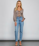 With fun and flirty details, Queen Of The Jungle Tie Front Top shows off your unique style for a trendy outfit for the summer season!