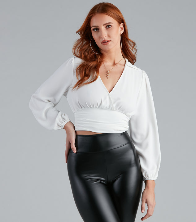 With fun and flirty details, High Collar Crepe Surplice Blouse shows off your unique style for a trendy outfit for the summer season!