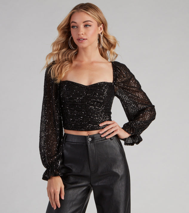 Chandelier Sequin Long Sleeve Crop Top creates the perfect New Year’s Eve Outfit or new years dress with stylish details in the latest trends to ring in 2023!