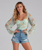 The trendy Gorgeous Florals Chiffon Corset Top is the perfect pick to create a holiday outfit, new years attire, cocktail outfit, or party look for any seasonal event!