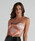 With fun and flirty details, Night Views Paisley Satin Scarf Top shows off your unique style for a trendy outfit for the summer season!