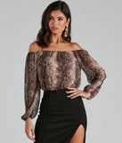 Chic Viper Chiffon Off-The-Shoulder Top creates the perfect New Year’s Eve Outfit or new years dress with stylish details in the latest trends to ring in 2023!