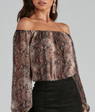 With fun and flirty details, Chic Viper Chiffon Off-The-Shoulder Top shows off your unique style for a trendy outfit for the summer season!