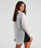 With fun and flirty details, Such A Staple Sheer Button-Up Tunic shows off your unique style for a trendy outfit for the summer season!