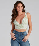With fun and flirty details, Flower Fields Satin Pleated Corset Top shows off your unique style for a trendy outfit for the summer season!