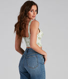With fun and flirty details, Flower Fields Satin Pleated Corset Top shows off your unique style for a trendy outfit for the summer season!