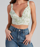 With fun and flirty details, Flower Fields Satin Pleated Corset Top shows off your unique style for a trendy outfit for the summer season!
